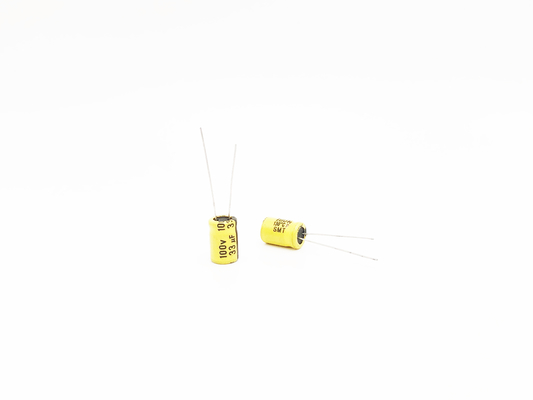 Kapasitor Suhu Tinggi Elektrolit Aluminium Kuning 33UF100V
