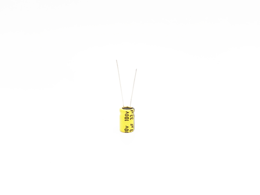Kapasitor Suhu Tinggi Elektrolit Aluminium Kuning 33UF100V