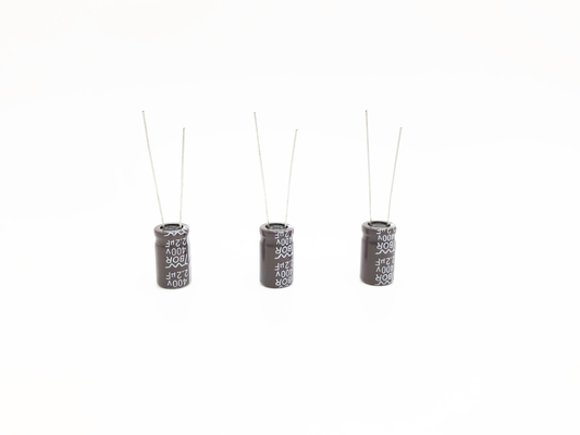 ISO9001 Aluminium Radial Electrolytic Capacitor 2.2UF400V Arus Riak Tinggi